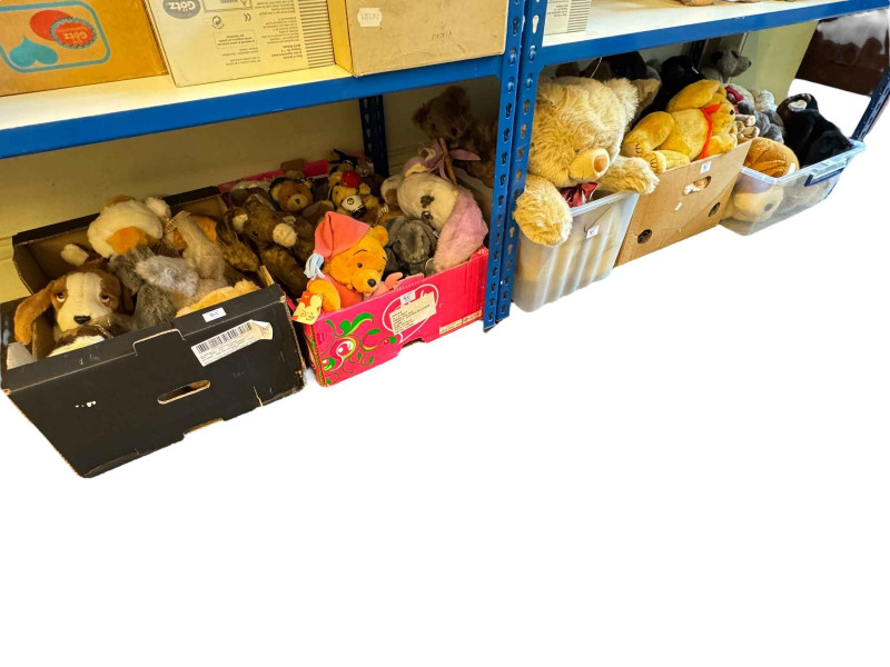 Large collection of soft toys and teddy bears.