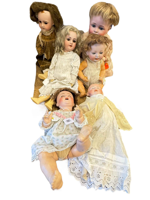 Six antique bisque dolls including Heinrich Handwerck and Kestner.
