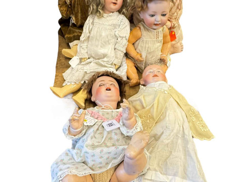 Six antique bisque dolls including Heinrich Handwerck and Kestner.
