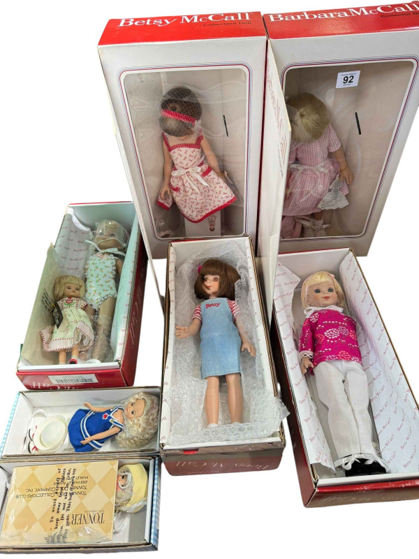 Seven boxed Betsy McCall dolls.