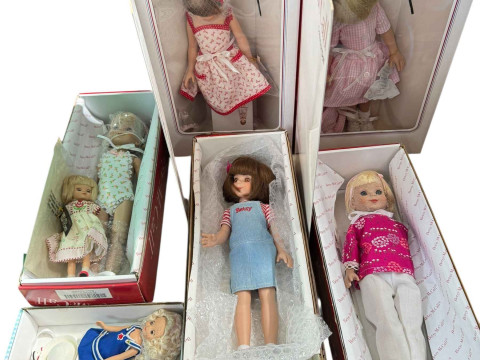 Seven boxed Betsy McCall dolls.