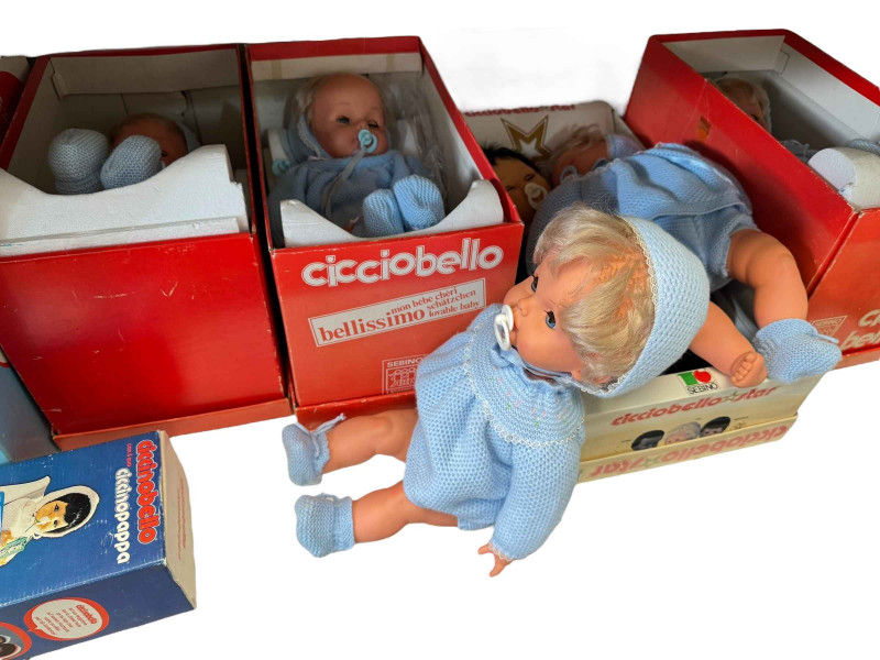Collection of Cicciobello dolls, mostly boxed.
