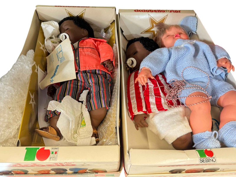 Collection of Cicciobello dolls, mostly boxed.