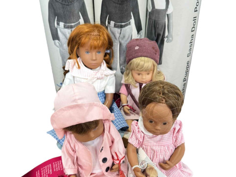 Four Sasha dolls, Babette, Elke, Iona and Christa, with tubes.
