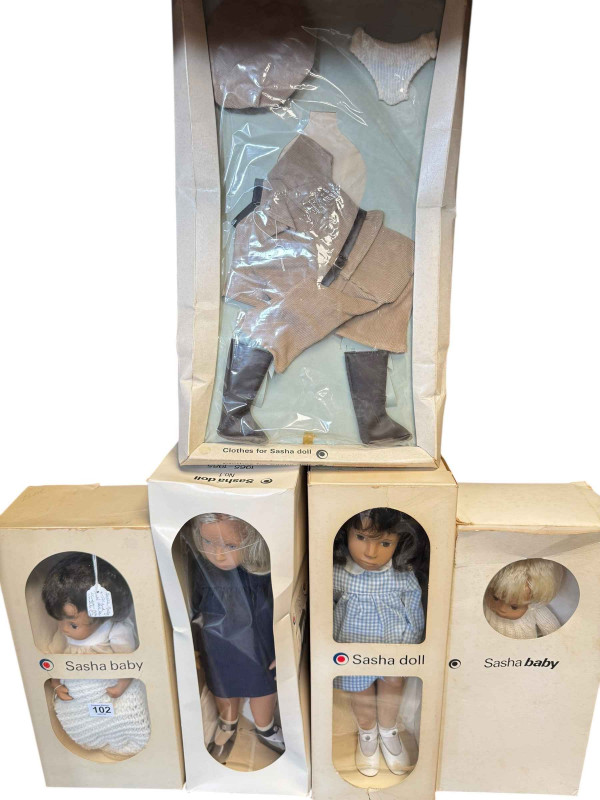 Two Sasha Baby dolls including Boy Woolly and two Sasha dolls including 1965-1985 doll and Brunette Gingham, all boxed.