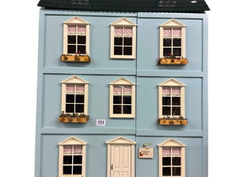 Three storey town house style dolls house from The Davey Collection, together...