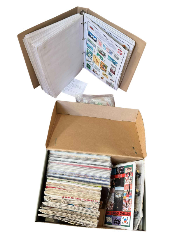 Collection of face value stamp presentation packs, tea cards, schoolboy stamp album, etc.