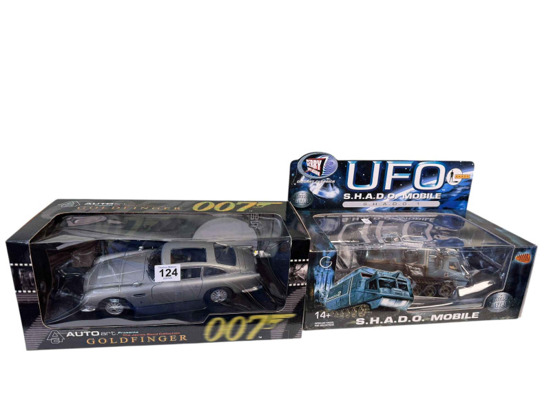 James Bond Goldfinger 007 Auto Art Aston Martin and a UFO S.H.A.D. mobile diecast vehicle.