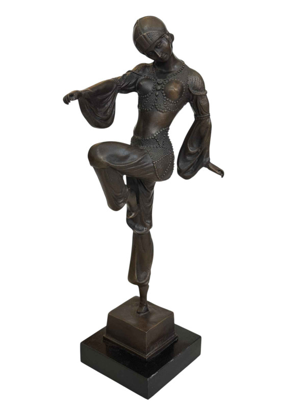 Art Deco style bronze lady in dancing pose on marble base, 44cm.