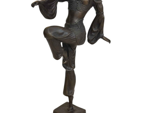Art Deco style bronze lady in dancing pose on marble base, 44cm.
