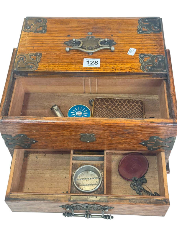 Victorian oak and brass bound smokers box, 16cm high.