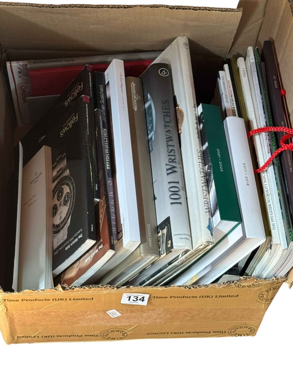 Box of watch books.