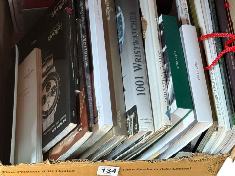 Box of watch books.