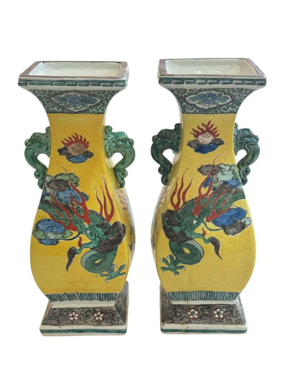 Pair Chinese two handle vases with dragon decoration, 30cm.
