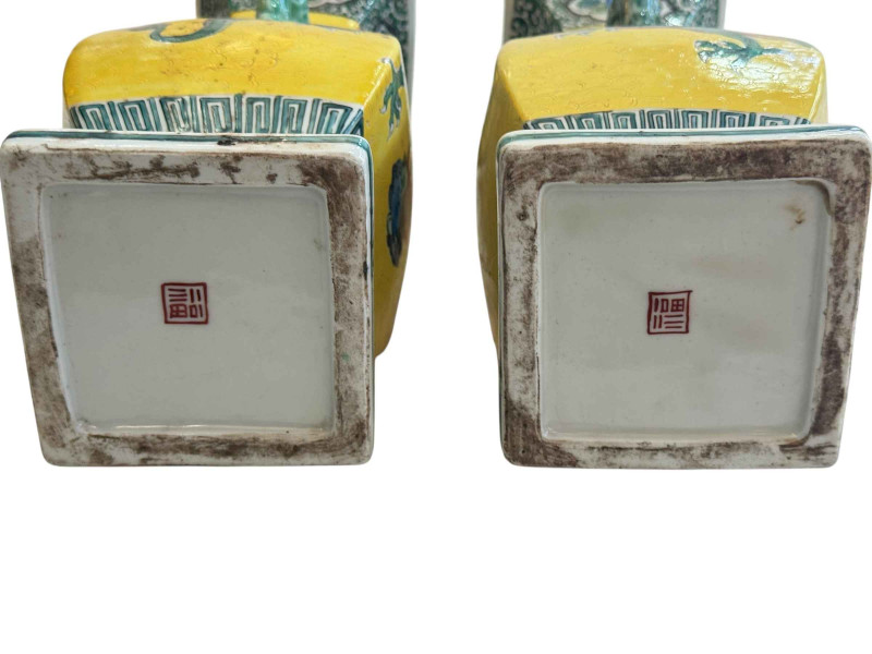 Pair Chinese two handle vases with dragon decoration, 30cm.