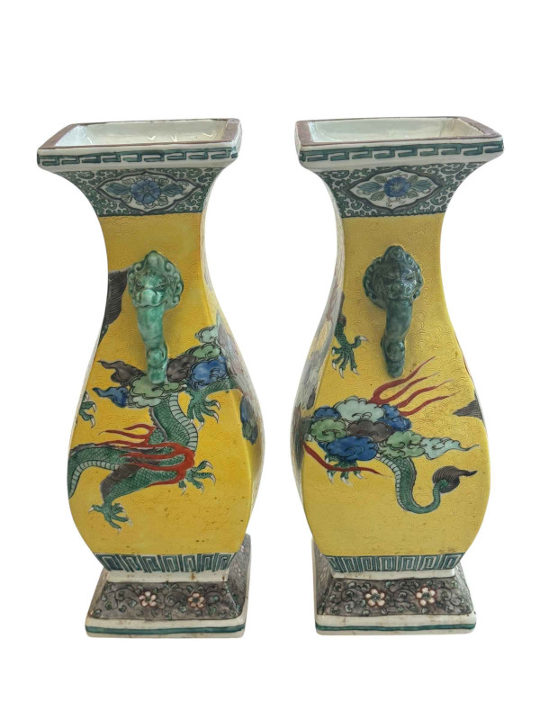 Pair Chinese two handle vases with dragon decoration, 30cm.