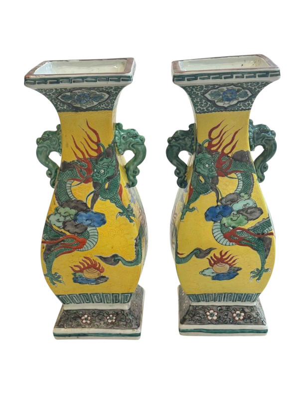 Pair Chinese two handle vases with dragon decoration, 30cm.