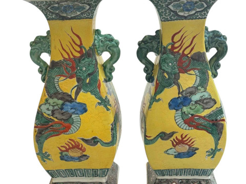 Pair Chinese two handle vases with dragon decoration, 30cm.