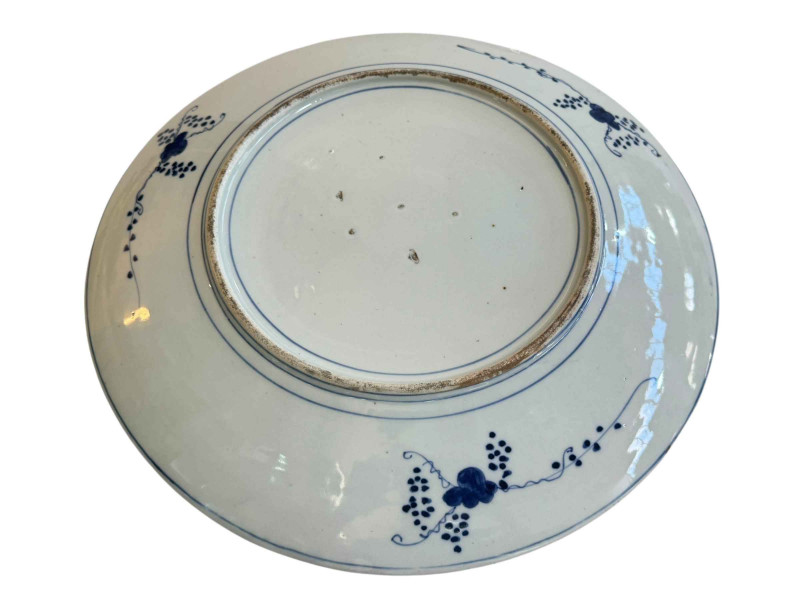Large blue and white Chinese charger decorated with house on lake in landscape scene, 46cm diameter.