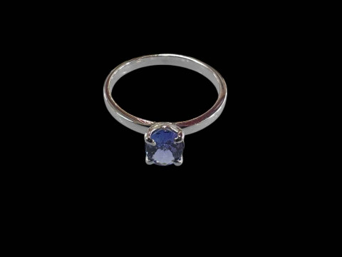 18 carat white gold and oval tanzanite single stone ring, size M.
