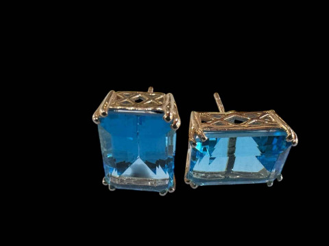 Pair of rectangular blue topaz earrings set in yellow gold, topaz over...