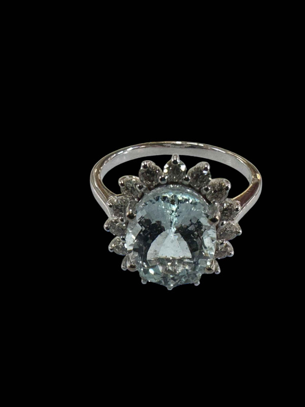 18 carat white gold, aquamarine and diamond cluster ring, size O.