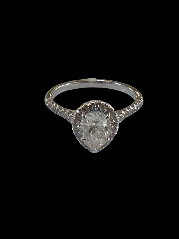 18 carat white gold pear shaped diamond cluster ring, size O.