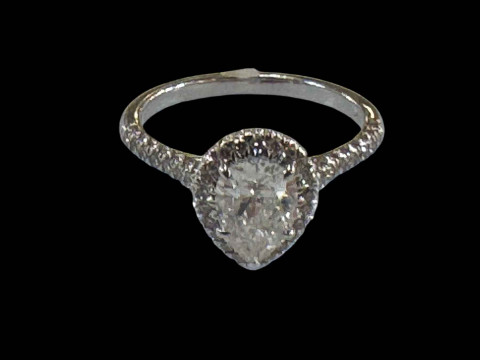 18 carat white gold pear shaped diamond cluster ring, size O.