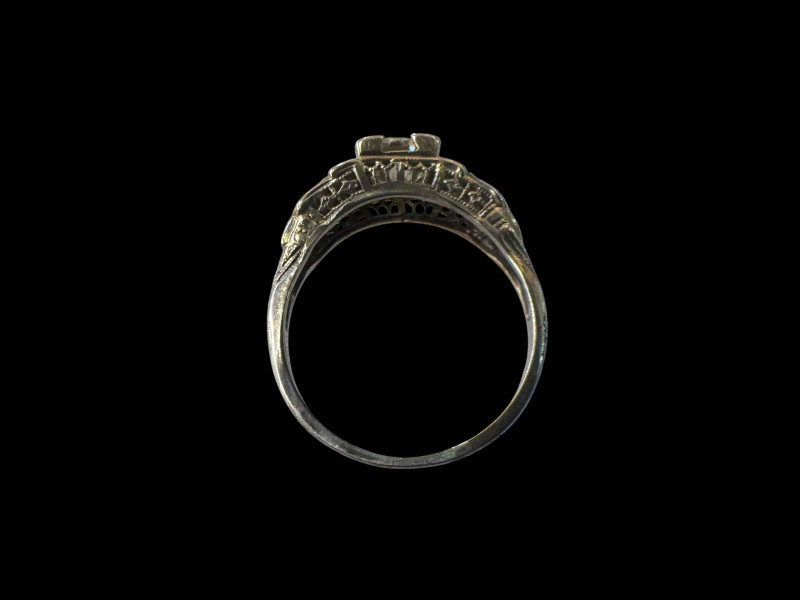 Solitaire diamond (approx 1 carat) 18 carat white gold ring, size N/O.