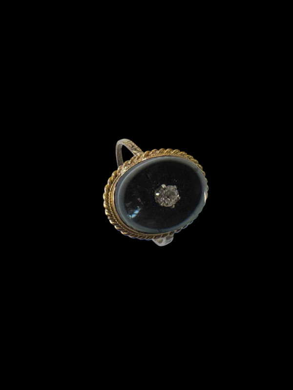 Early 19th Century gold mourning ring with diamond on onyx and hair locket, inscribed John Birket 1819, size R.