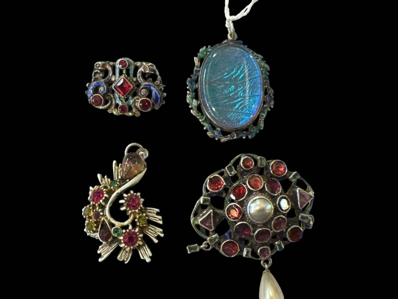 Two Austro Hungarian brooches and two pendants.