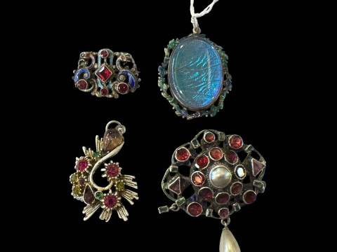 Two Austro Hungarian brooches and two pendants.
