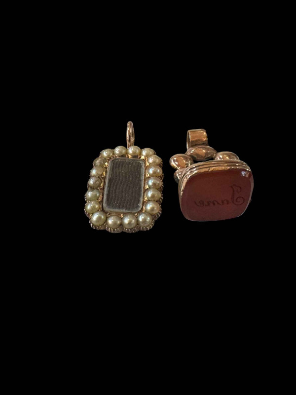 Two 19th Century gold fobs, one mourning with 1826 inscription.