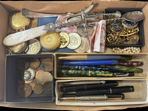 Box with pens, coinage, watches, etc.