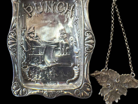 Silver 'Punch' pin tray, Chester 1894, and CLARET silver bottle tag, Birmingham...