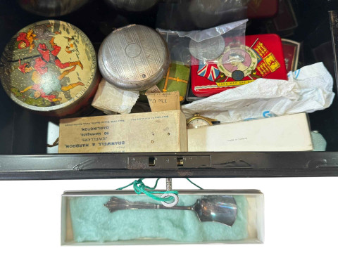 Tin of collectables including coins, tins, spoons, etc.
