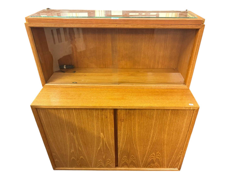 Adjustable teak three section wall unit.