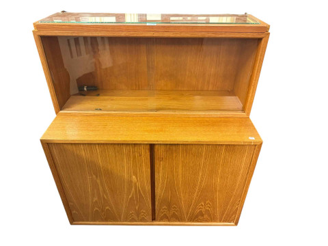 Adjustable teak three section wall unit.