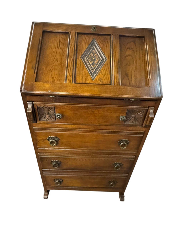 Slim Old Charm oak four drawer bureau, 99cm by 54cm by 44cm.