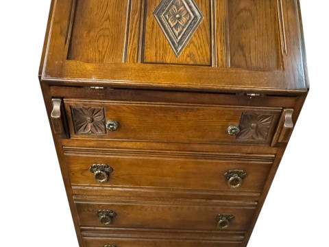Slim Old Charm oak four drawer bureau, 99cm by 54cm by 44cm.