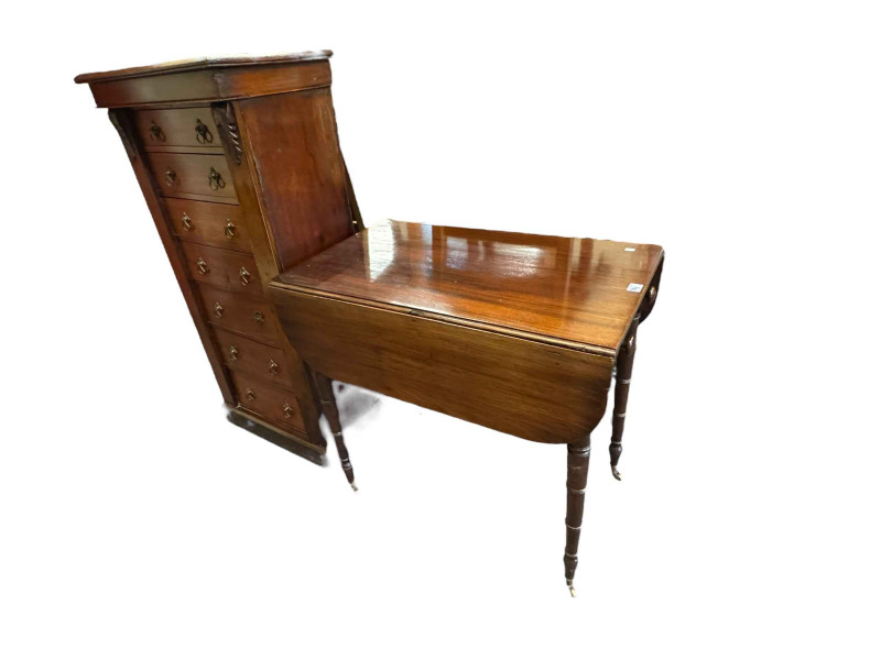 Victorian mahogany seven drawer Wellington chest, 115cm by 55cm by 36cm, and 19th Century Pembroke table on ring turned legs (2).