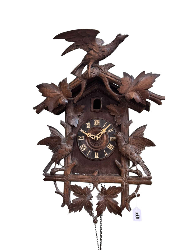 Black Forest carved cuckoo clock.