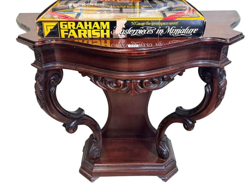 Polished mahogany Victorian style shaped front hall table, 81cm by 98.5cm by 50.5cm.