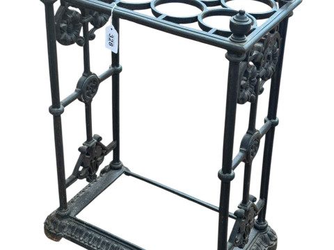 Cast iron eight division stick stand, 64cm by 41cm by 26cm.
