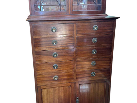 Edwardian mahogany cabinet having two astragal glazed doors above two...
