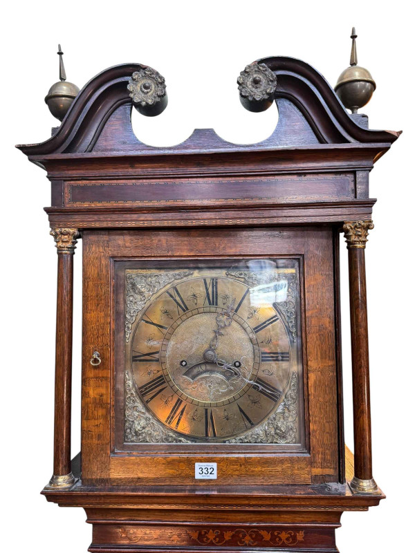 Antique inlaid oak and mahogany eight day longcase clock having square brass dial, signed Laurence Earnshaw, 220cm.
