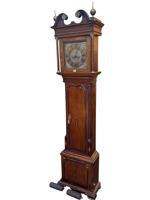 Antique inlaid oak and mahogany eight day longcase clock having square brass dial, signed Laurence Earnshaw, 220cm.