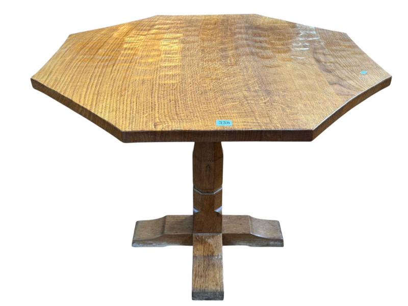 Derek 'Lizardman' Slater octagonal adzed oak centre table raised on octagonal pedestal to four feet, 72cm by 89cm by 90cm.