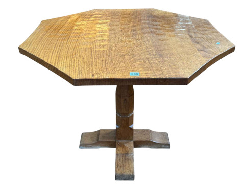 Derek 'Lizardman' Slater octagonal adzed oak centre table raised on octagonal...