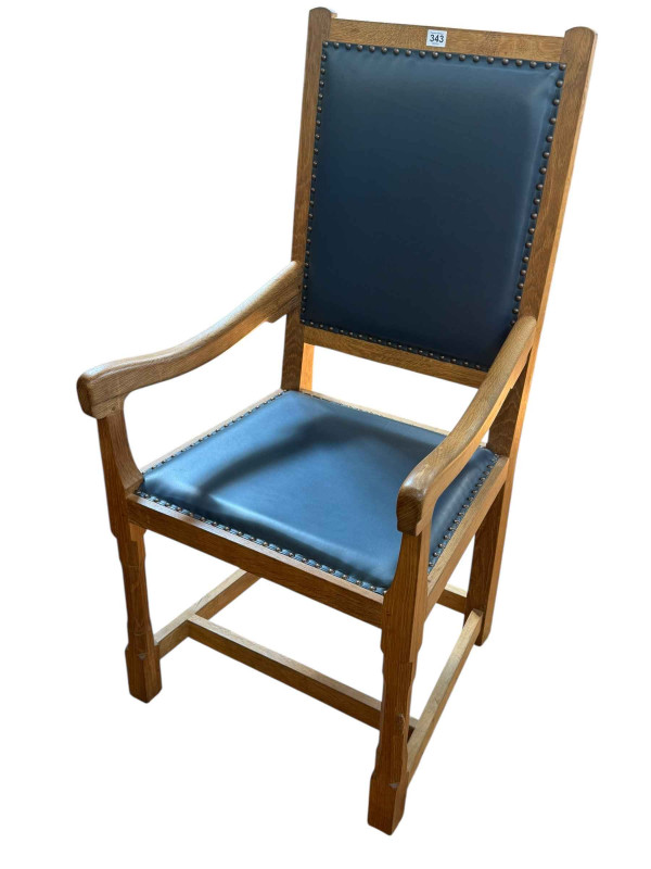 Peter 'Rabbitman' Heap oak and blue studded hide elbow chair.